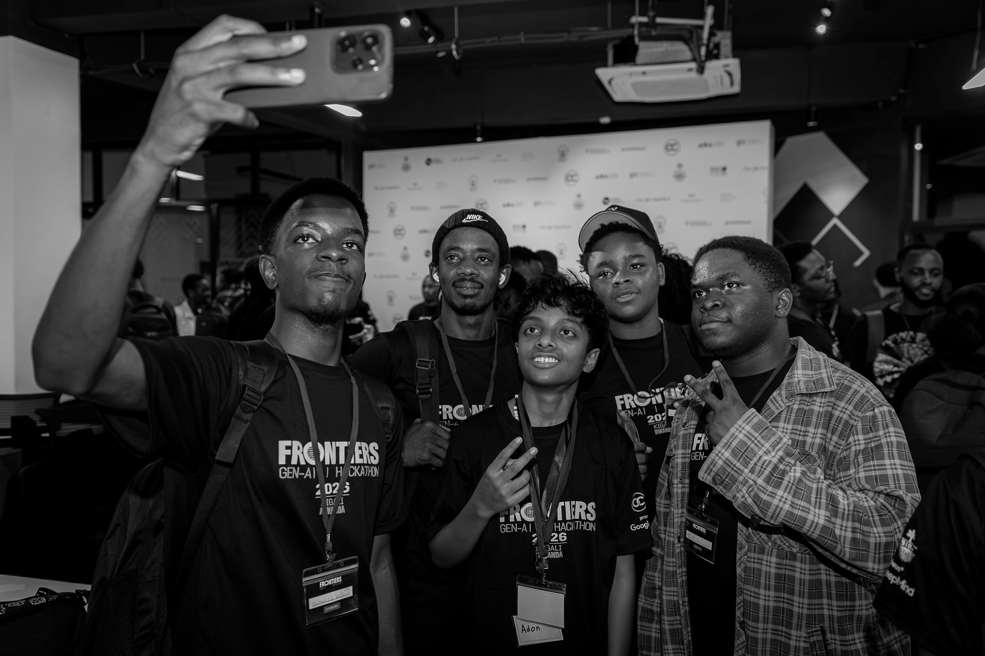 Student builders celebrating together at the Frontiers Gen-AI Hackathon, Kigali